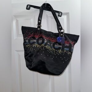 Coach bag with sequins.